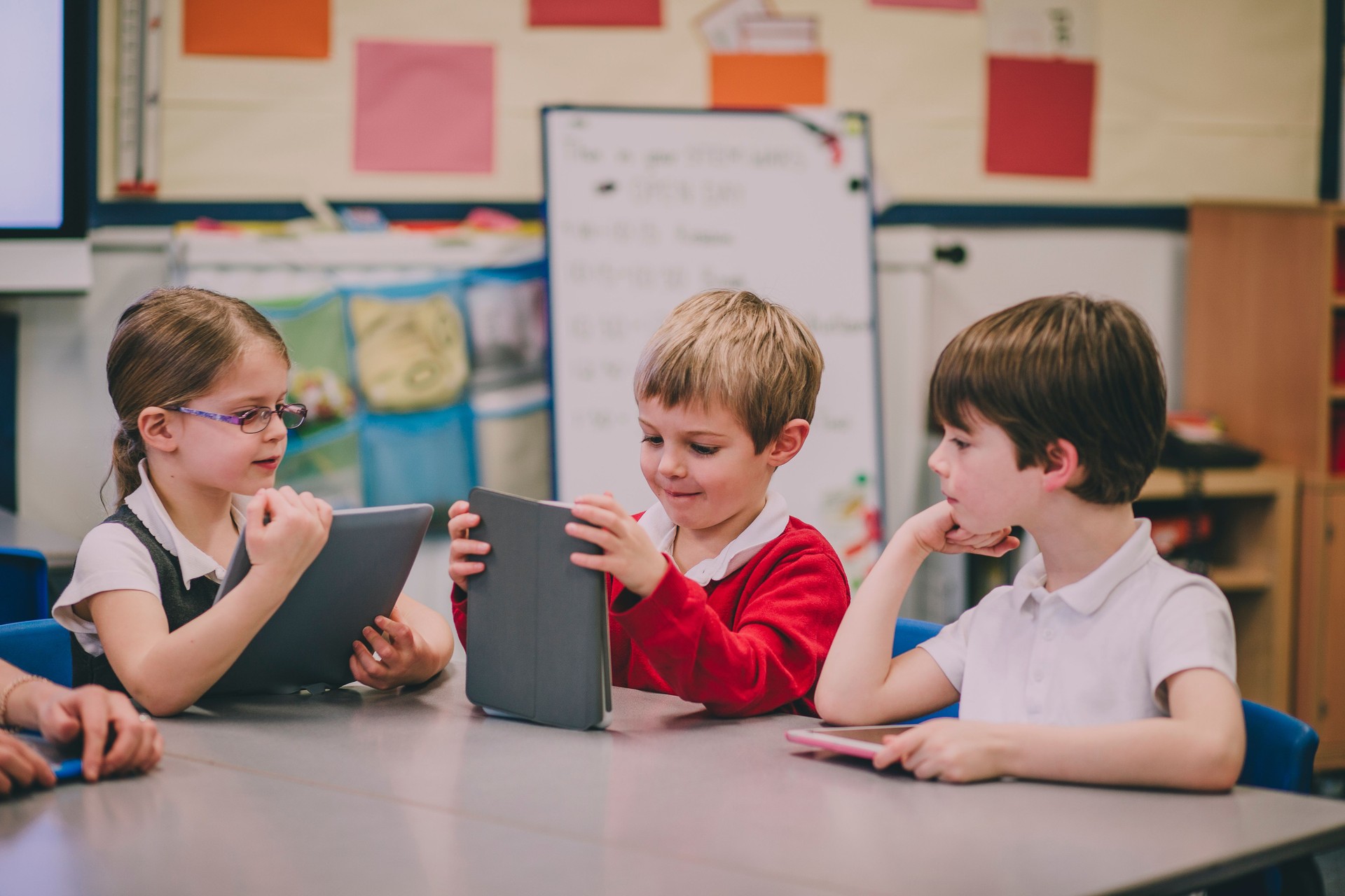 Students Using Digital Tablet